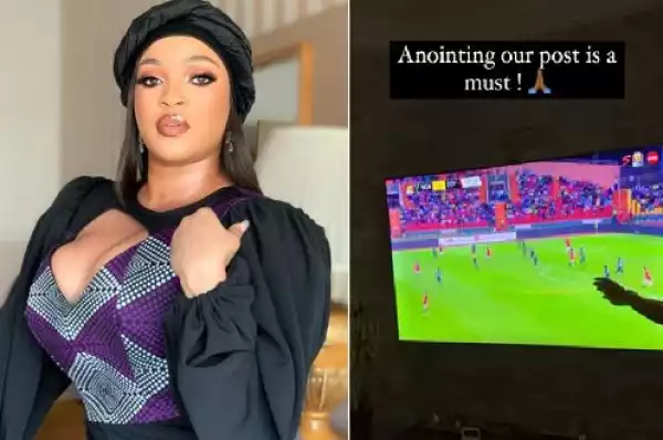 Video Of Joseph Yobo’s Wife, Adaeze, Anointing The Screen Before Nigeria/Egypt Match