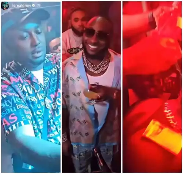 Davido Looks On Happily As His Aide, Isreal DMW Makes Money Rain on a Stripper (Video)
