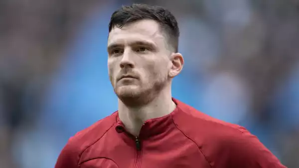 Andy Robertson booked after appearing to be struck by assistant referee