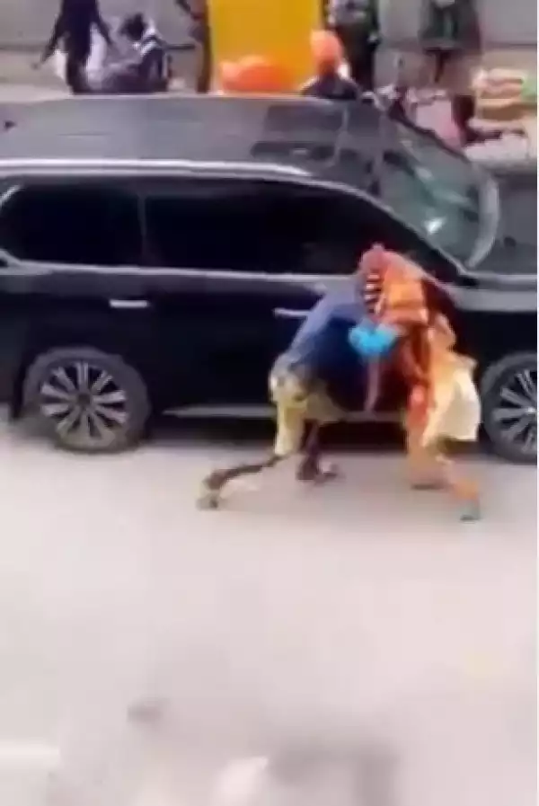 Drama As Man Is Seen Headbutting A Masquerade In Lagos (Video)
