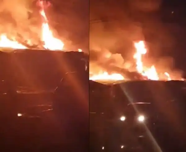 Properties worth millions of Naira destroyed as fire razes 11 shops in Lagos (photos/videos)