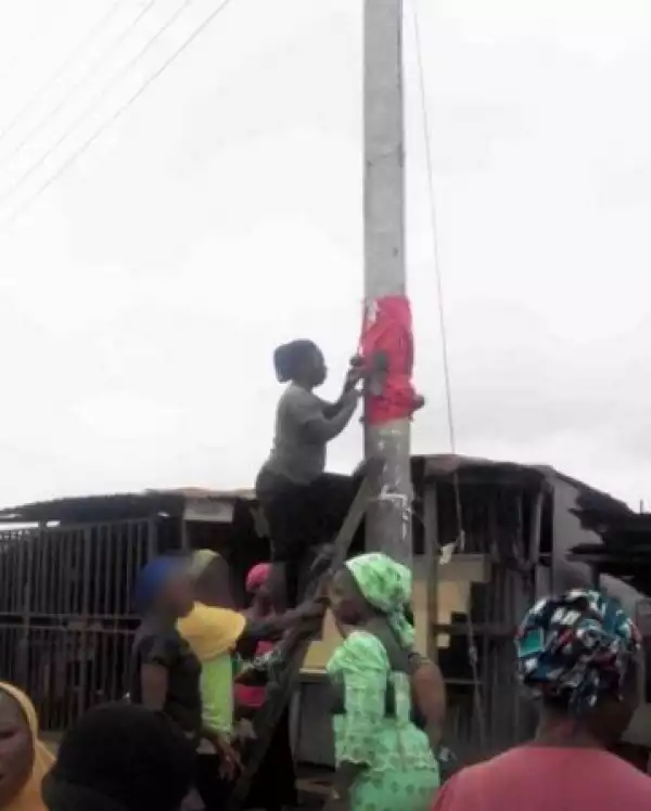 YEPA!! Residents Planted Charm On Electric Pole To Avoid NEPA From Climbing (SEE PHOTO)