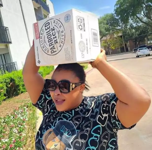 America Will Level You - Actress Dayo Amusa Laments Over Absence Of A Helper As She Carries Rice On Her Head