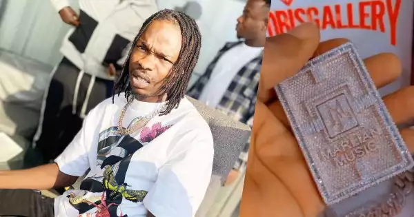 Singer, Naira Marley Gifts Himself A Customized Diamond Neck Chain (Video)