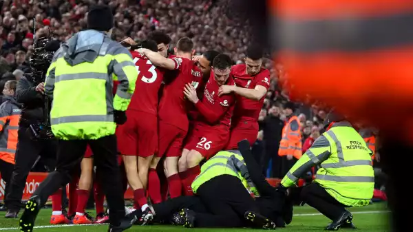 Liverpool begin investigation into pitch invader who collided with Andy Robertson