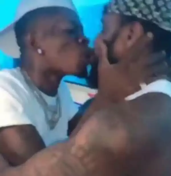 Mixed Reaction As Shatta Wale Is Spotted Kissing His Male Security Guard On The Mouth After Gifting A Diamond Neck Chain (Video)