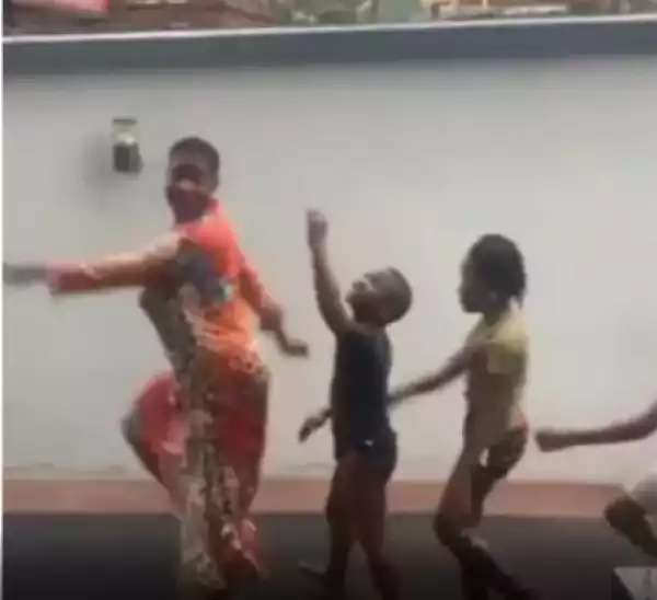 Actress Mercy Johnson Spotted Playing In The Rain With Her Children (Video)