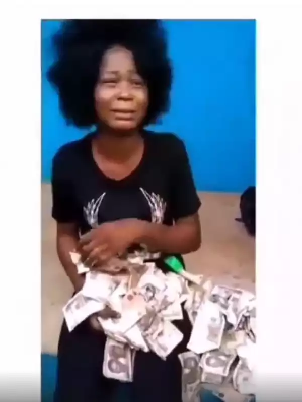 Lady nabbed while trying to deposit N200k worth of fake currency at a POS facility in Benin (video)