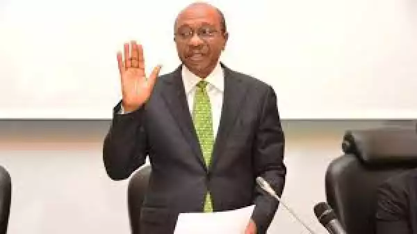 Emefiele Returns To Nigeria, Heads To Office With Massive Military Protection