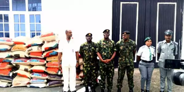 Nigerian Navy Intercepts Boat Laden With Contraband, Bags Of Rice In Lagos Community