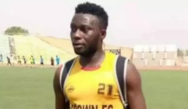 Nigerian Footballer Slumps During Football Match