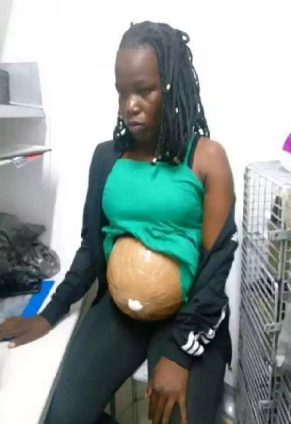 Woman Nabbed Attempting To Steal From A Store Using Fake Pregnancy Belly (Photos)