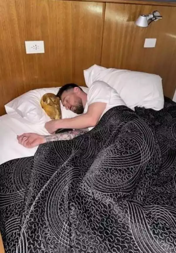 Photos Of Lionel Messi Sleeping With World Cup Trophy In Bed