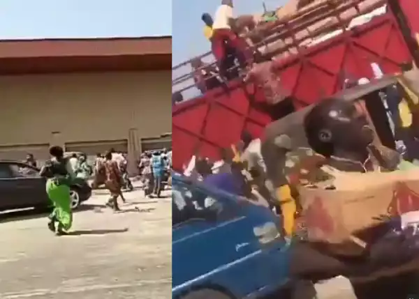 Kwara state residents invade warehouse in Ilorin Airport road, cart away COVID-19 palliatives (Videos)