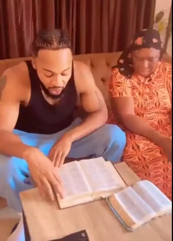Popular Singer, Flavour Seen Reading Bible With His Mum (Video)