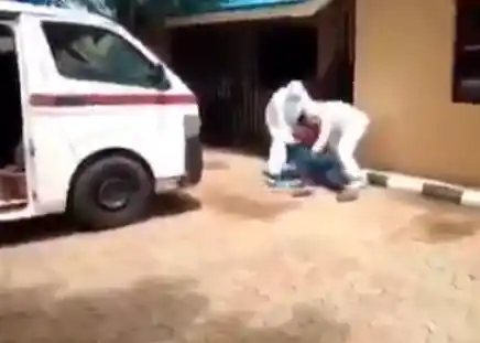 Nigerian man wrestles with health officials trying to evacuate him to an isolation center (video)