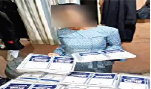 Police confirm arrest of woman with laminated INEC materials