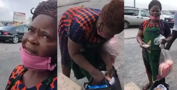 TEARY!!! Food Seller Breaks Down In Tears After Man Surprised Her With Cash Gift On The Road (Watch Video)